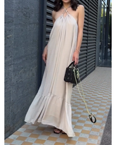 Feature-length dress with empty halter