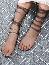 Diamond-Encrusted Perspective Mesh Star Stocking