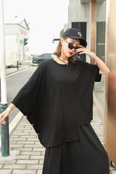 Women Round Neck Solid Color Bat Sleeve Irregular T-Shirt